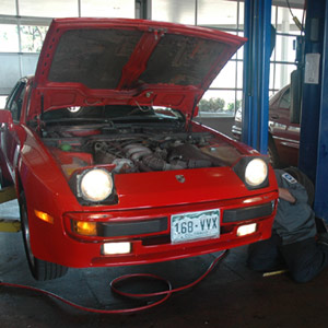 Car being serviced at an auto repair shop in Highlands Ranch